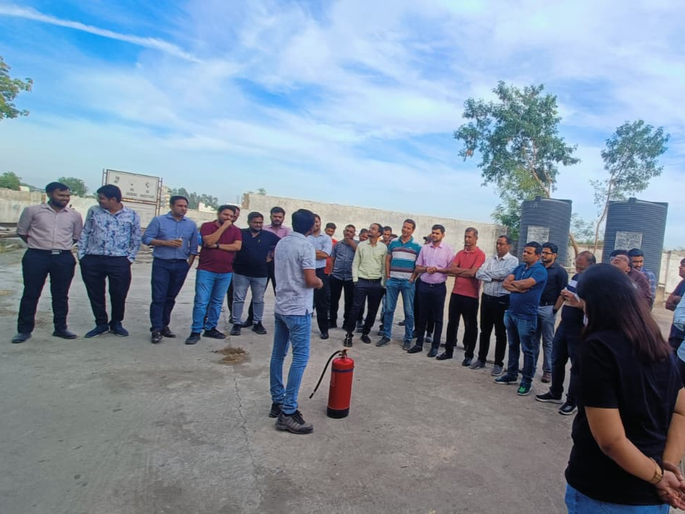 20 Microns team participating in a workplace safety demonstration